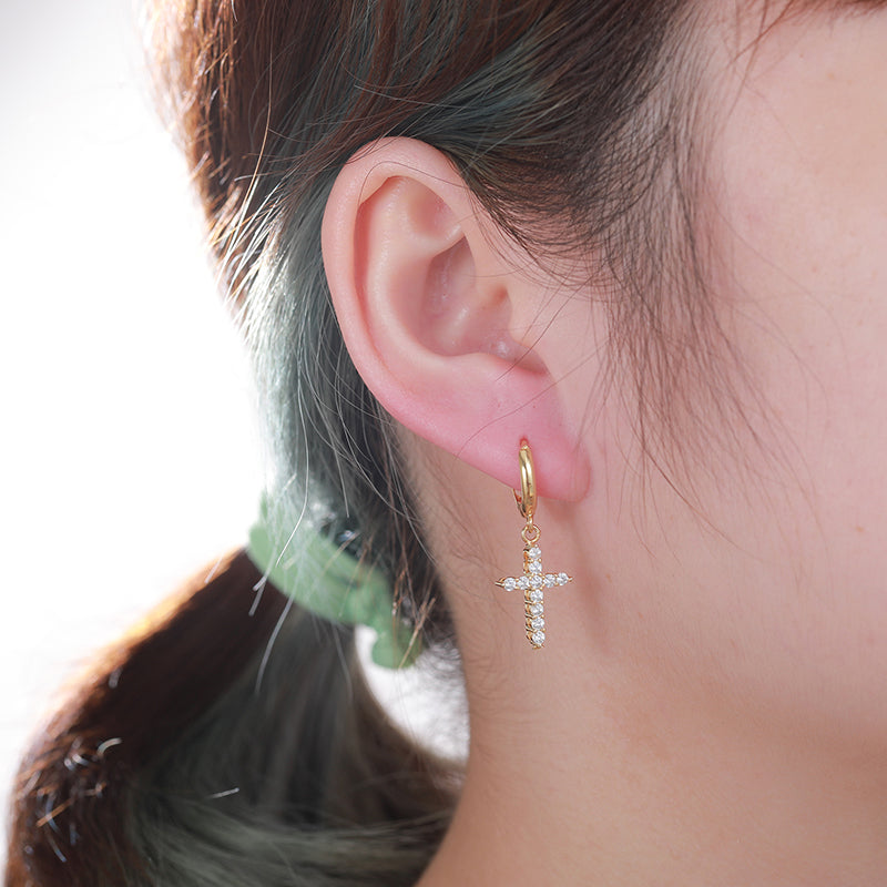 Moissanite cross hoop earrings worn