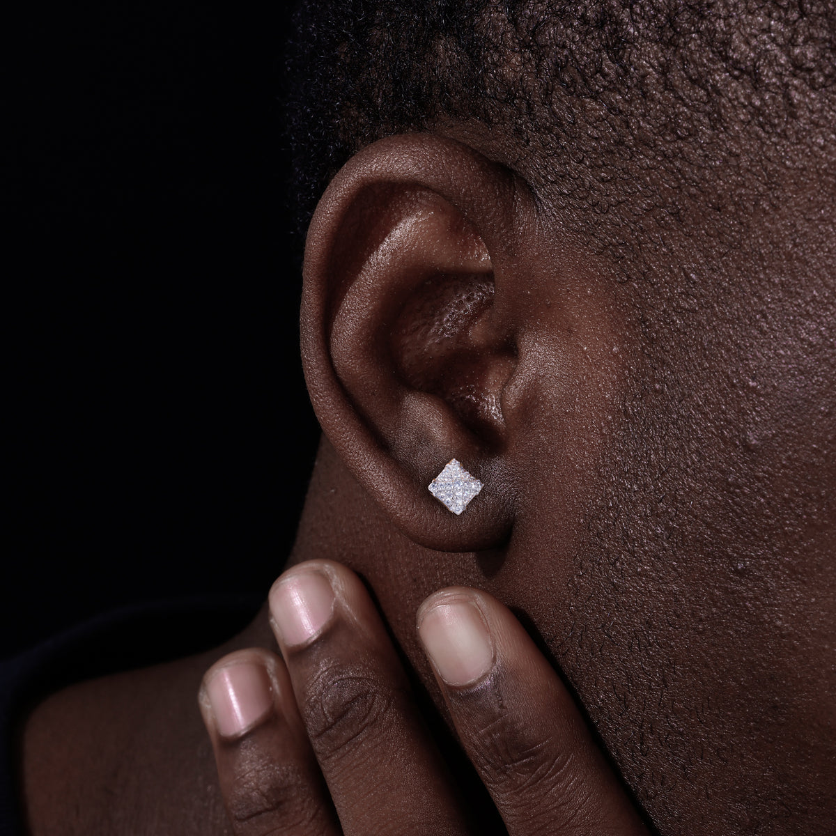 Diamond-shaped moissanite cluster stud earrings worn