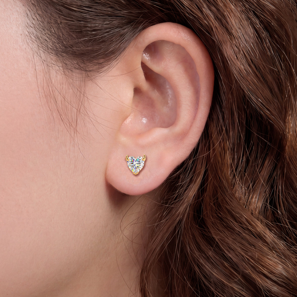 Heart-cut devil moissanite stud earrings worn