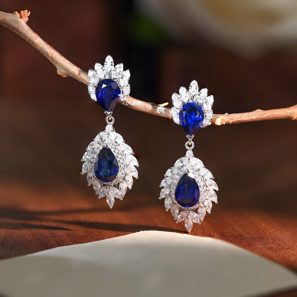 1.5 Carat Pear Cut Lab-Grown Sapphire Halo Ring 925 sterling silver, alternate presentation