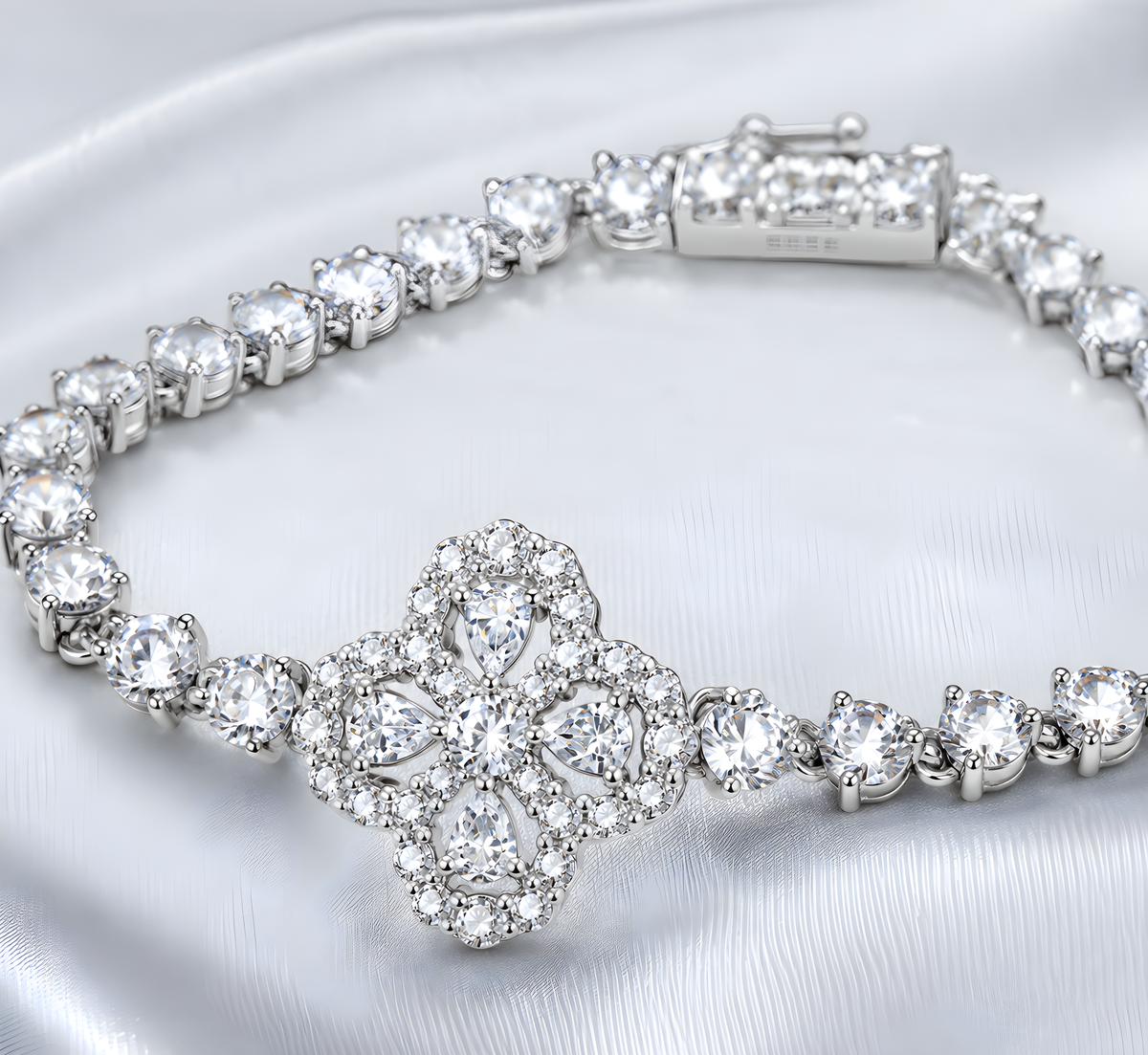 Close-up of a round-cut moissanite bracelet with a floral centerpiece on satin