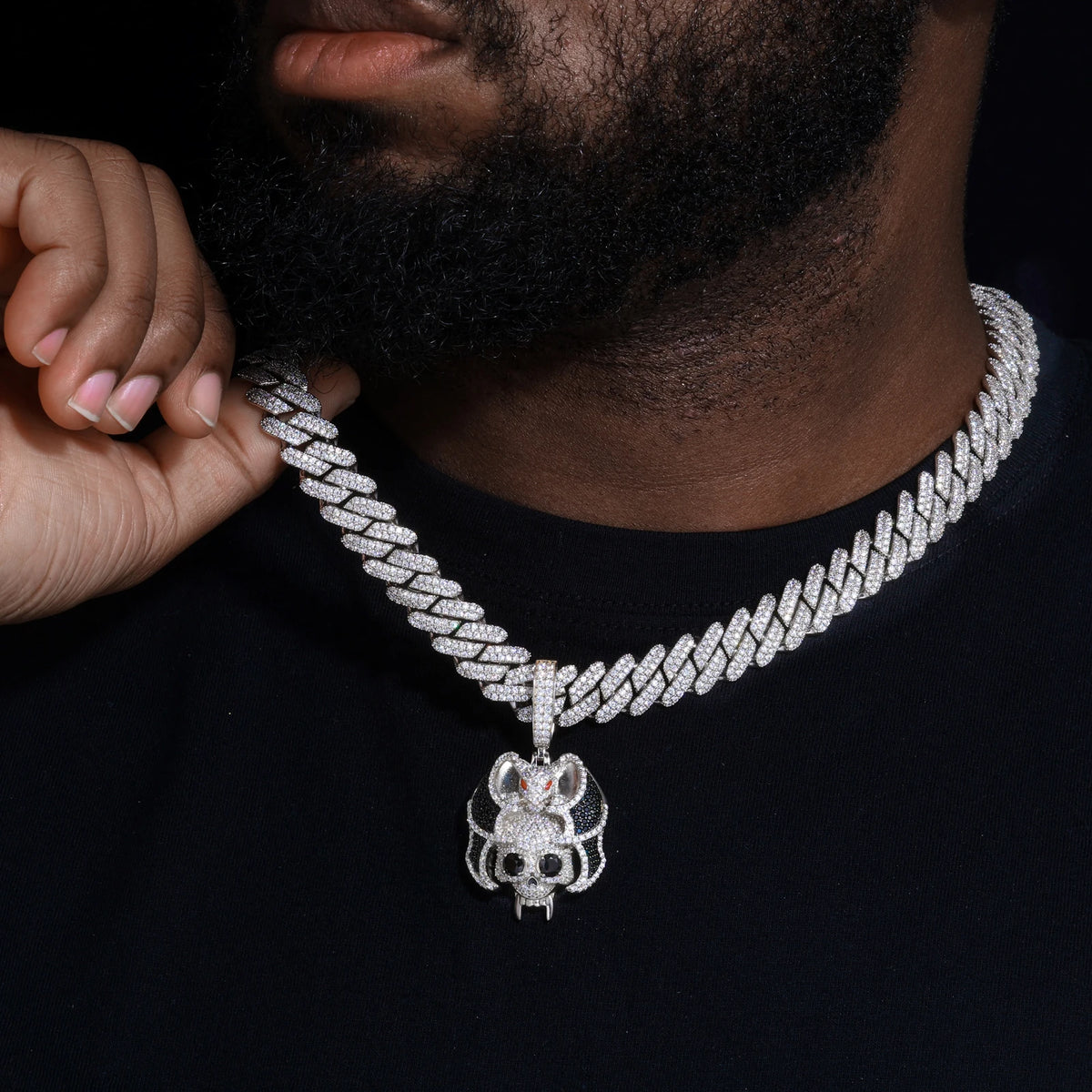 Silver-tone bat skull moissanite pendant worn view