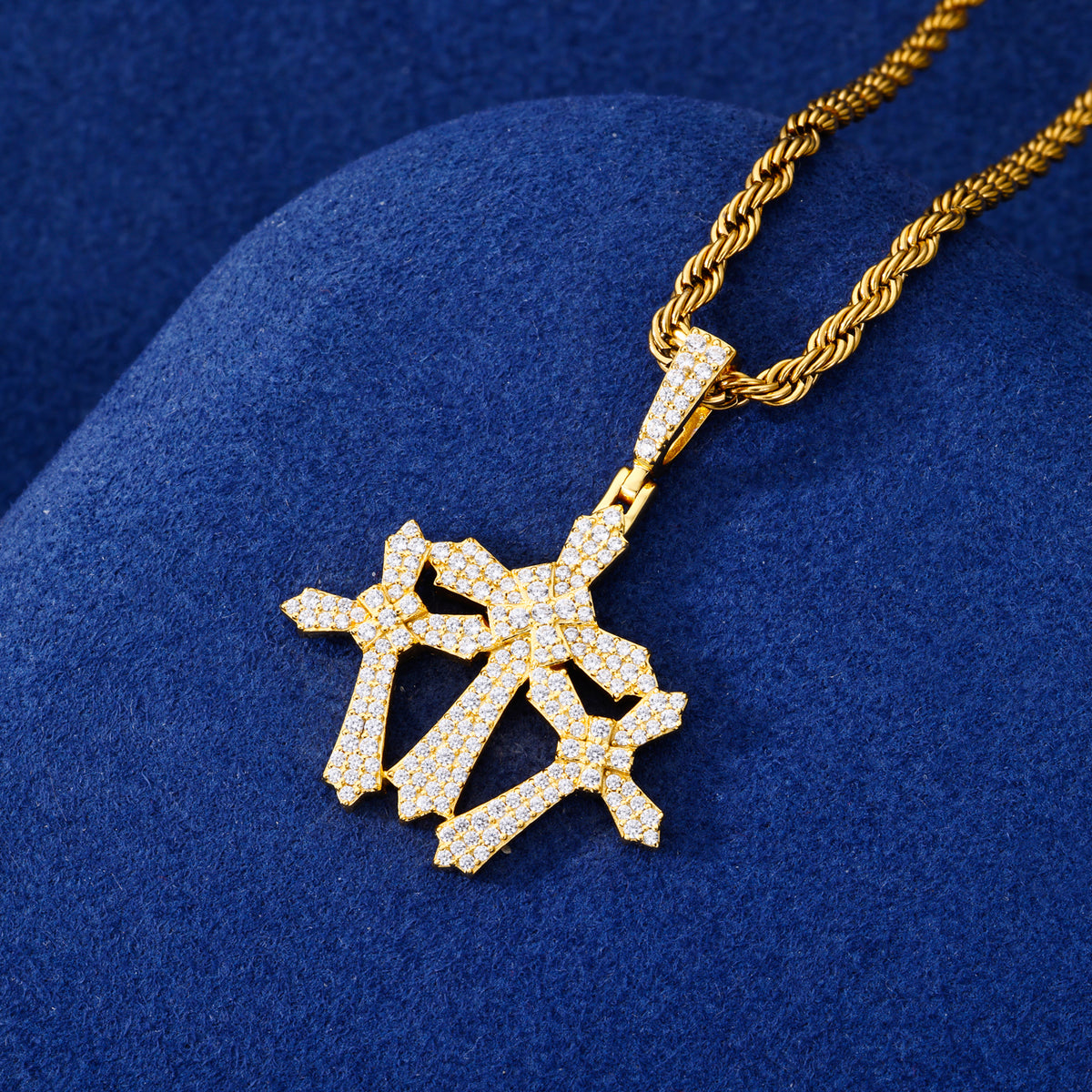 Gold-tone compact triple cross moissanite pendant