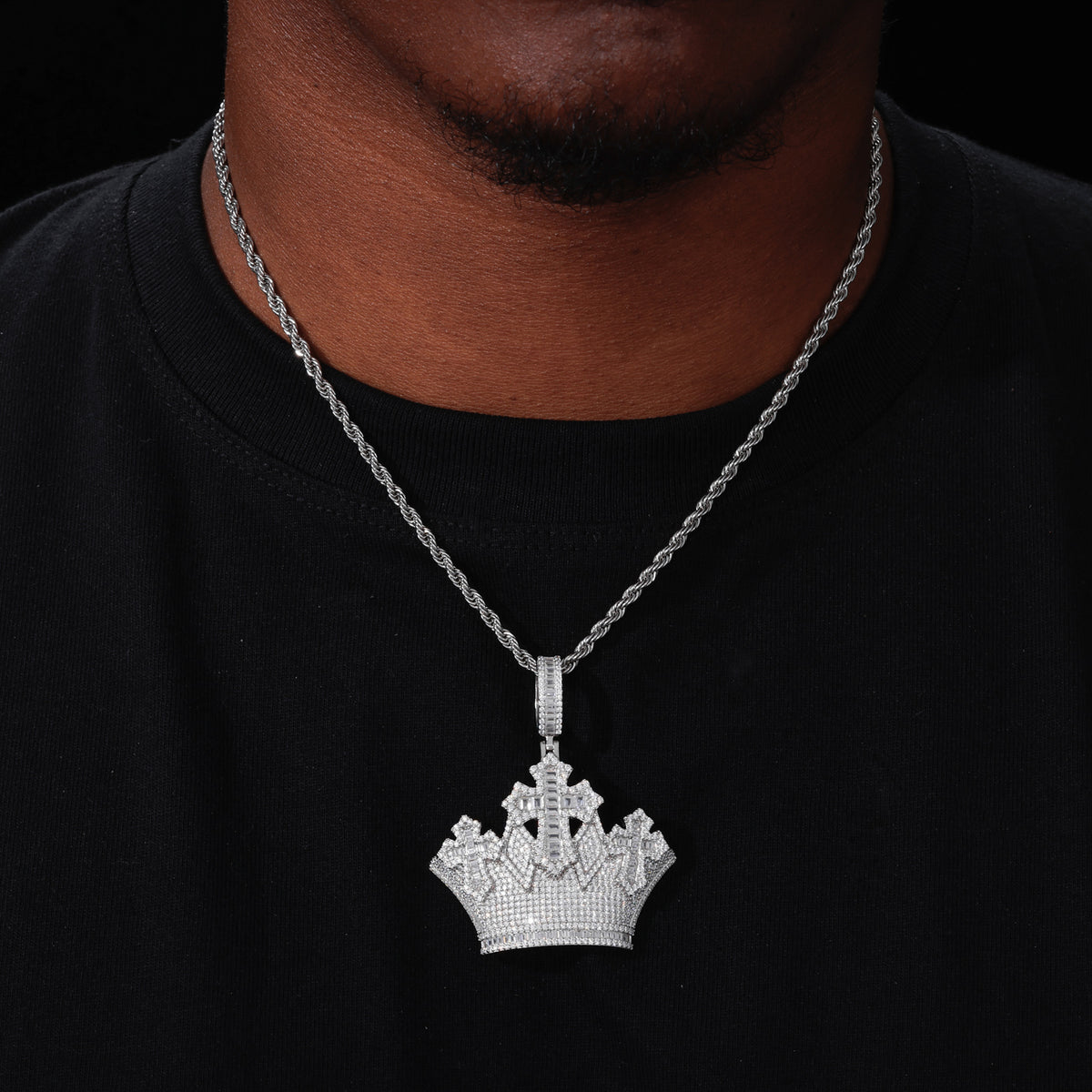 Silver-tone crown cross moissanite pendant worn