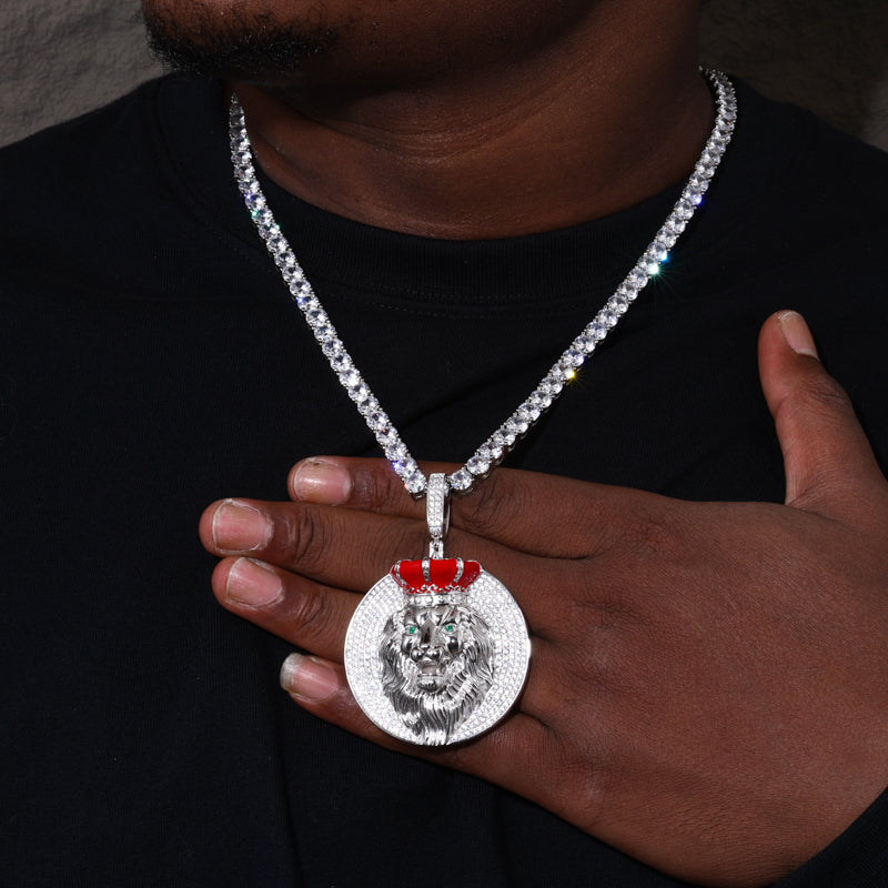 Crown lion moissanite pendant shown for scale