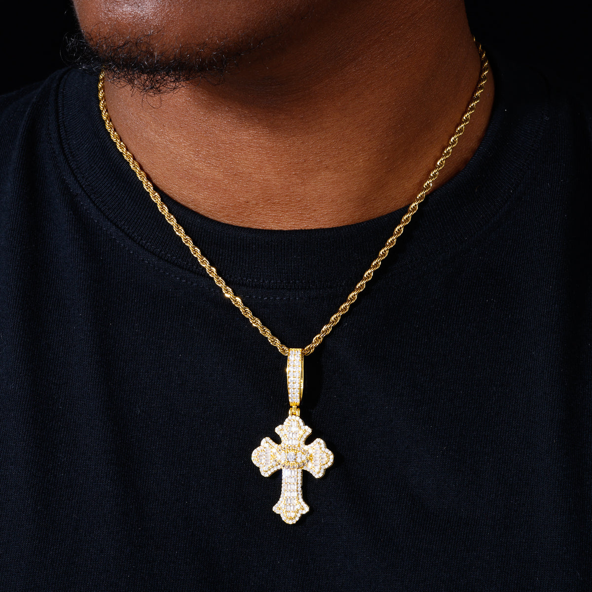 Gold tone evil eye iris cross moissanite pendant worn