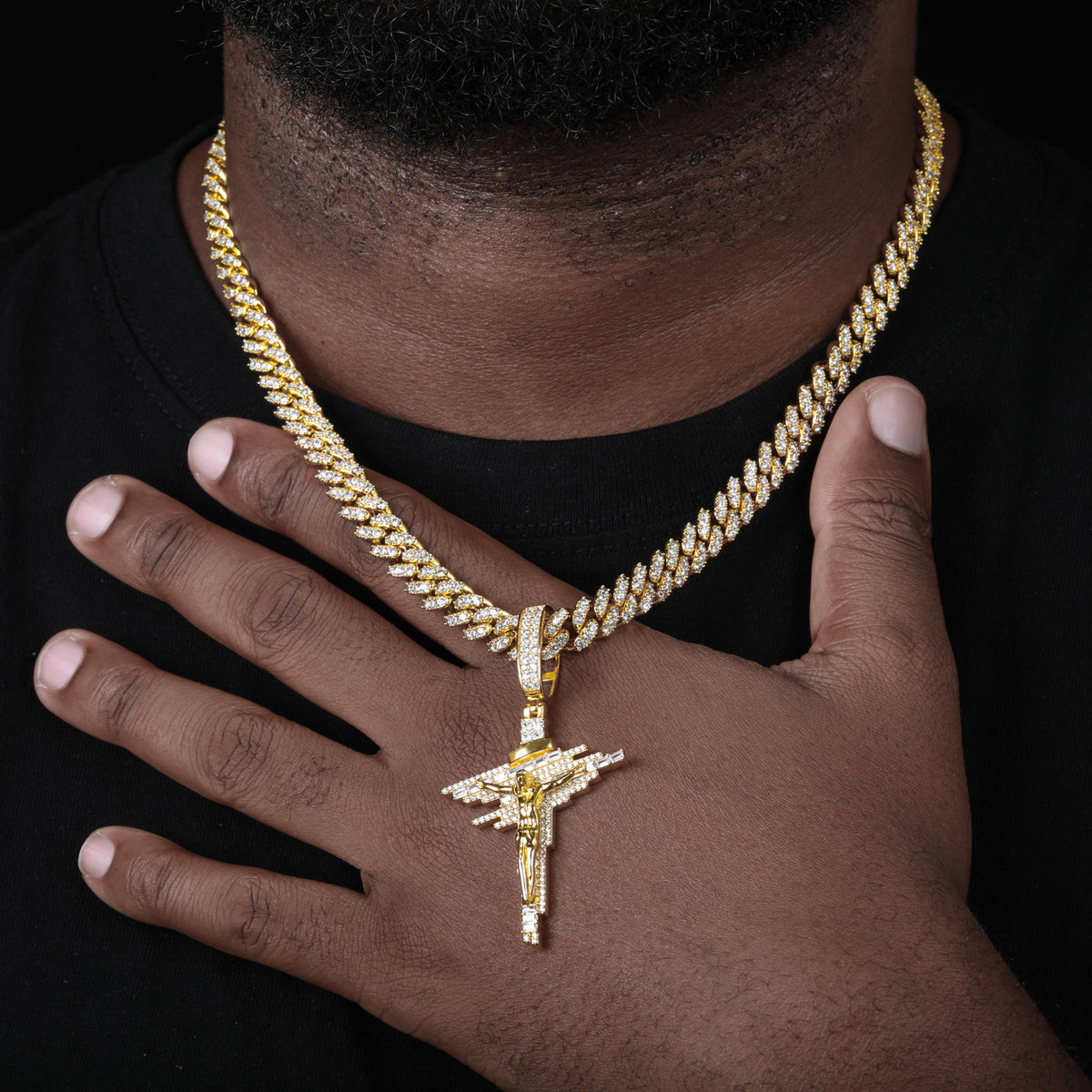 Gold-tone geometric crucifix moissanite pendant worn