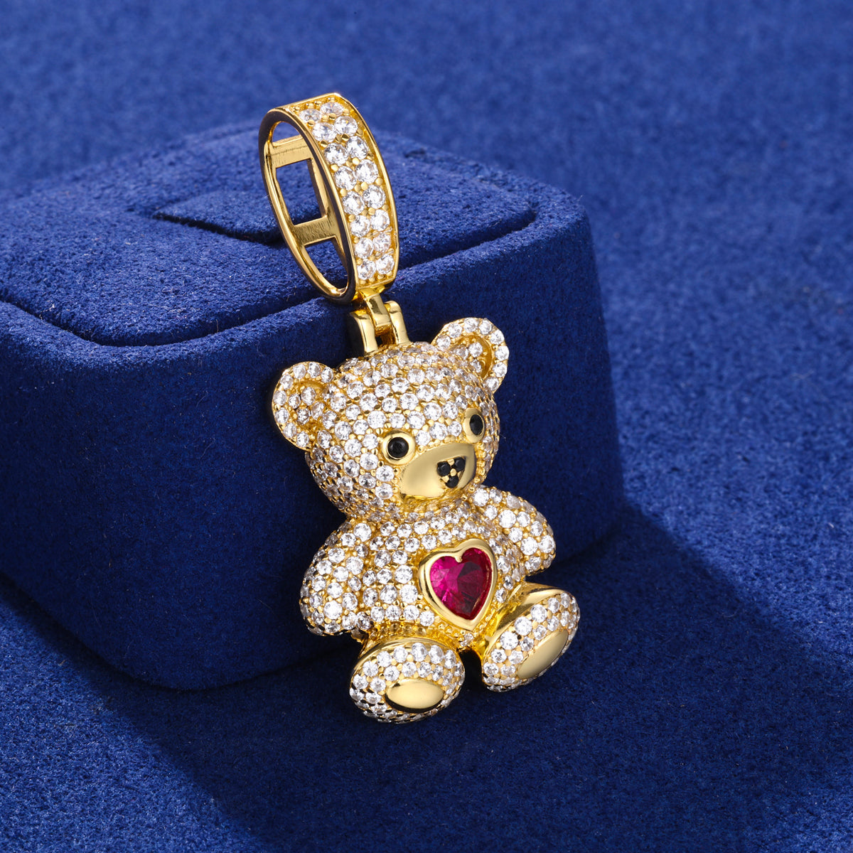 Gold-tone heart bear moissanite pendant close up