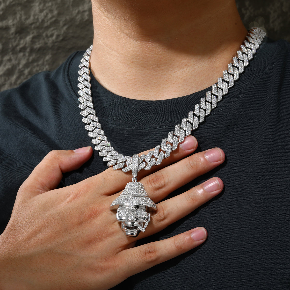 Silver-tone iced-out skull hat moissanite pendant worn