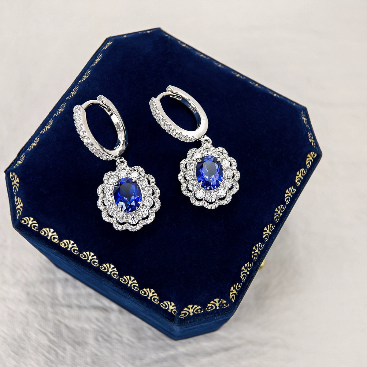 K gold-plated 925 sterling silver blue sapphire halo huggie earrings, detail view