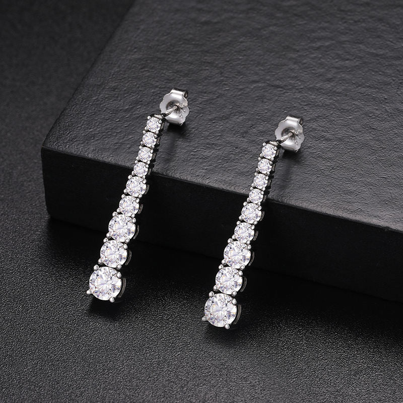 Long moissanite drop earrings front view