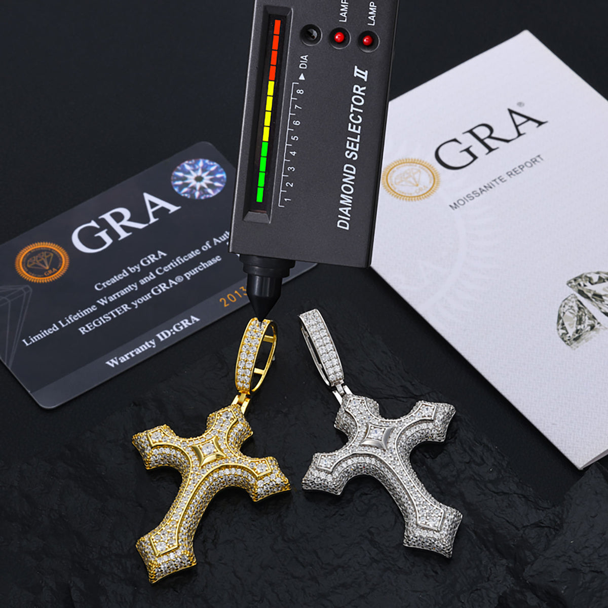 Silver-tone and gold-tone cross pendants with tester