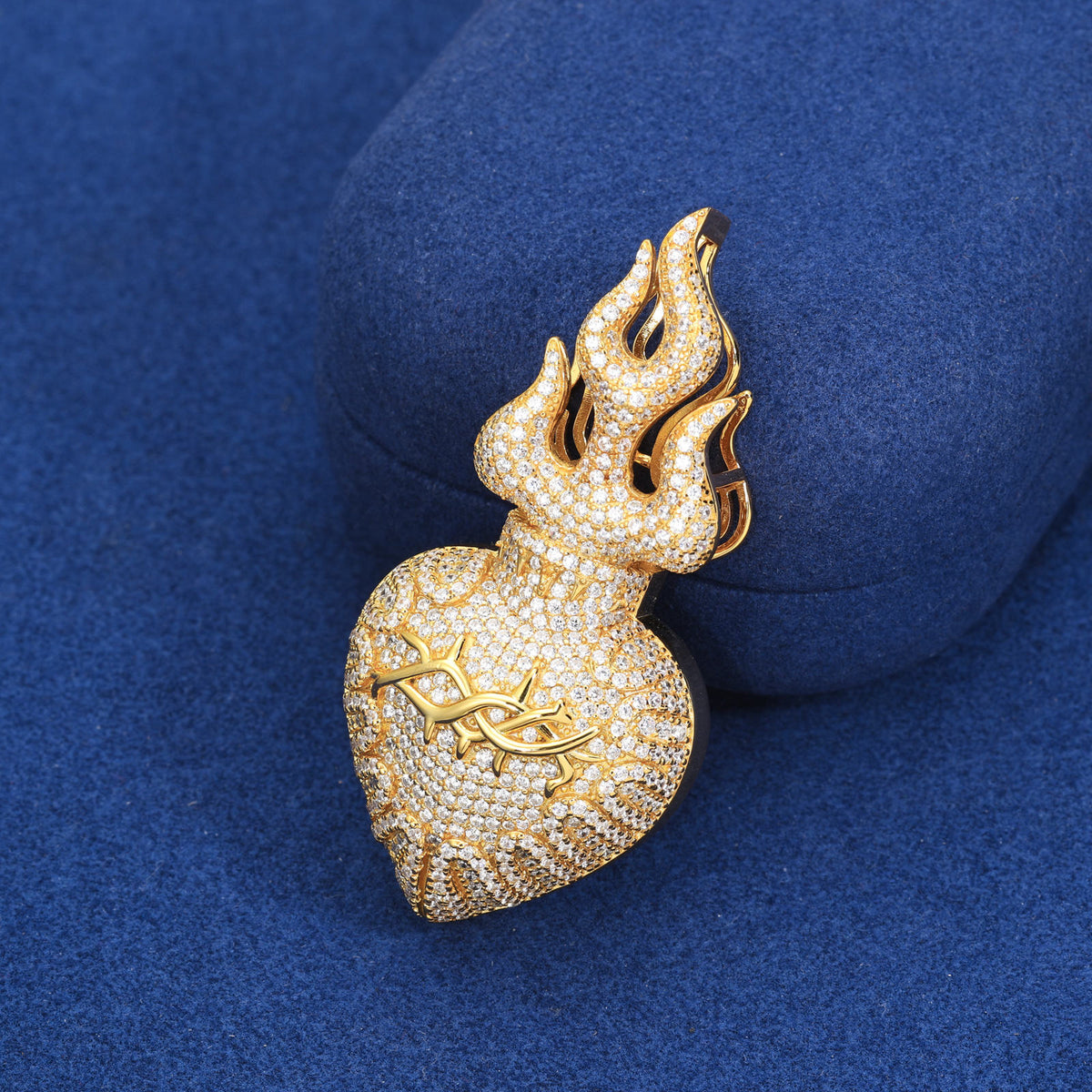 Gold-tone iced flame heart moissanite pendant