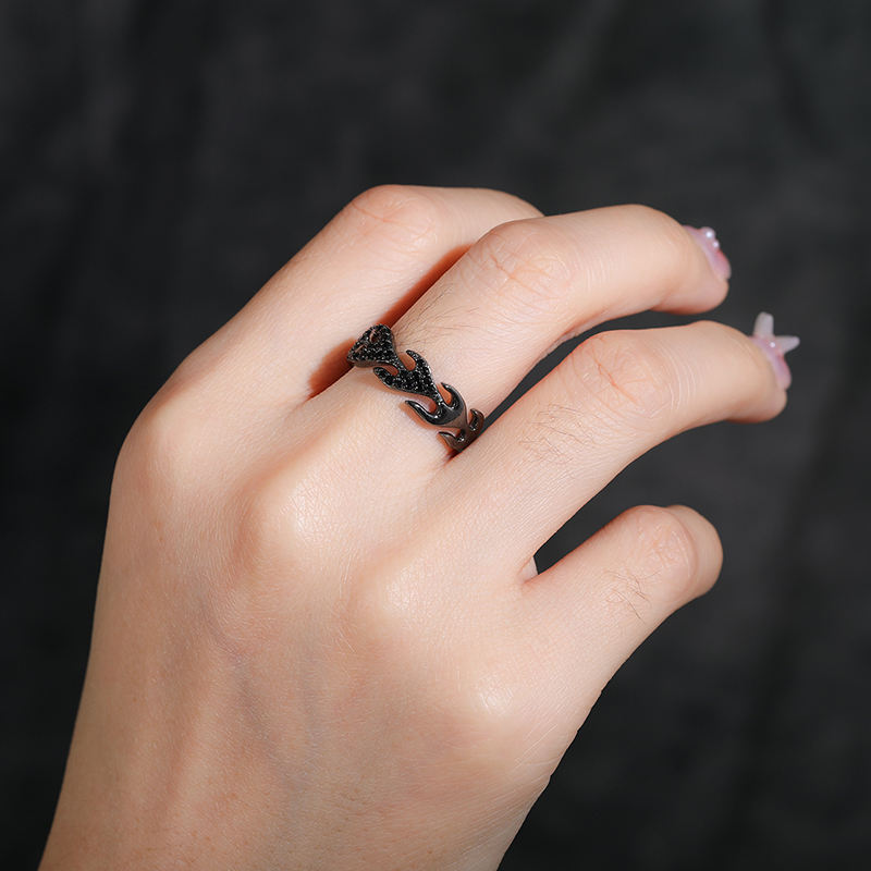 Black flame open ring styled on hand