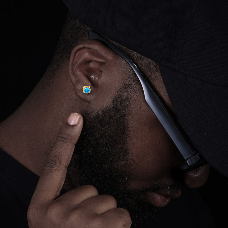 Blue CZ stud earring worn