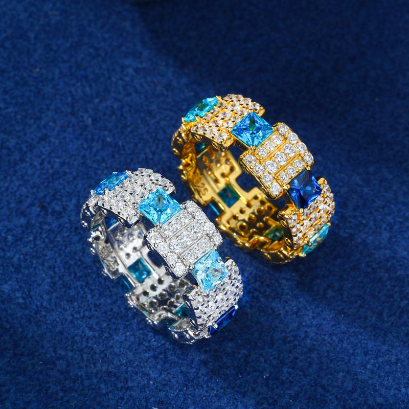 Silver and gold blue CZ geometric rings