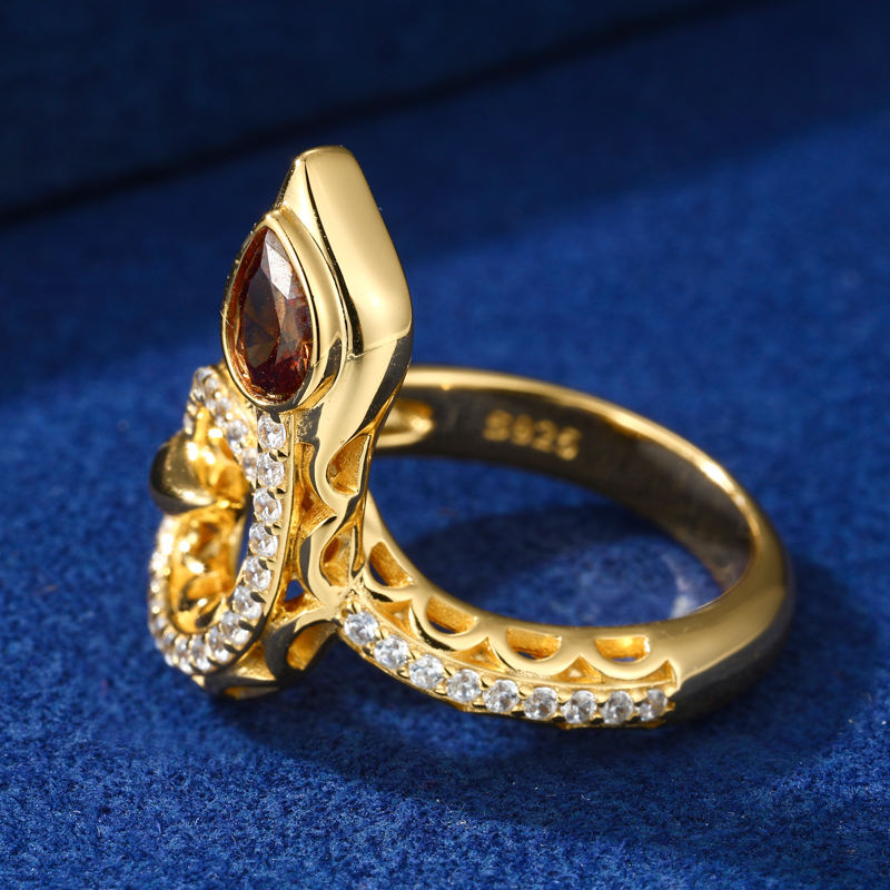Gold-tone snake moissanite ring side view