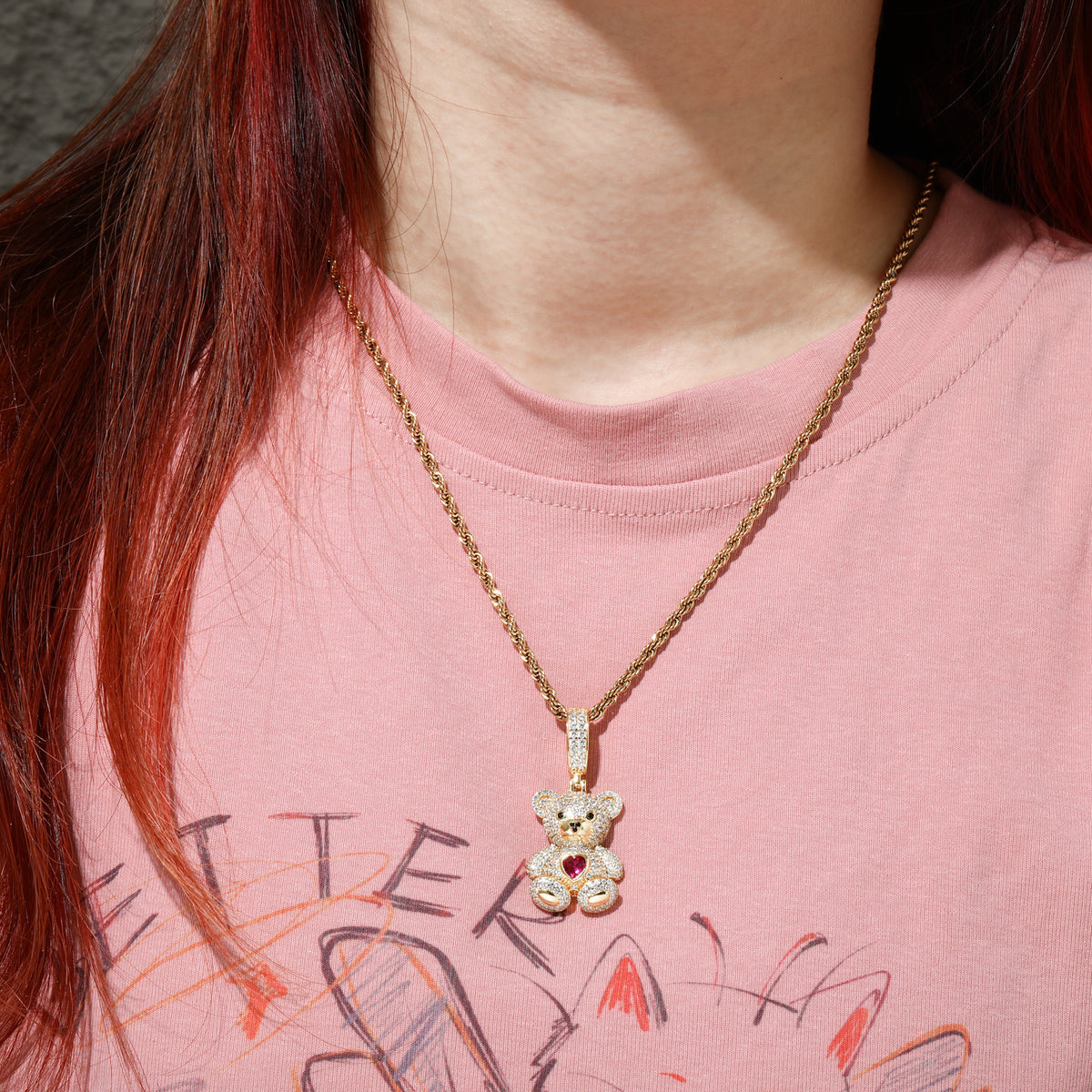 Gold-tone teddy bear moissanite pendant styled with chain