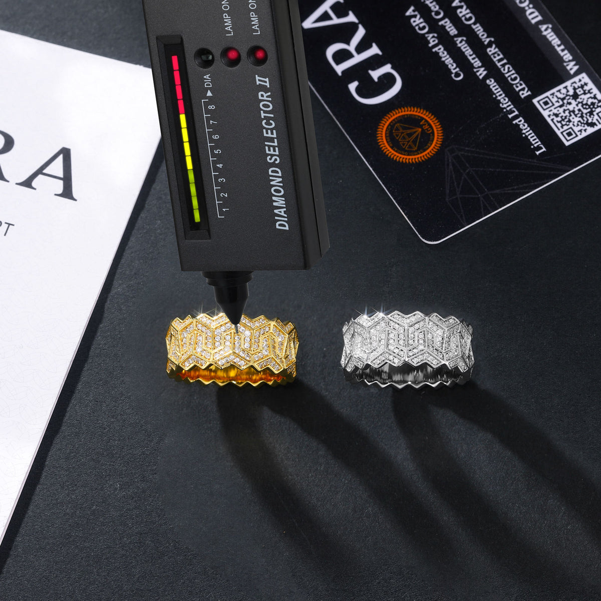 Silver and gold geometric moissanite bands with tester