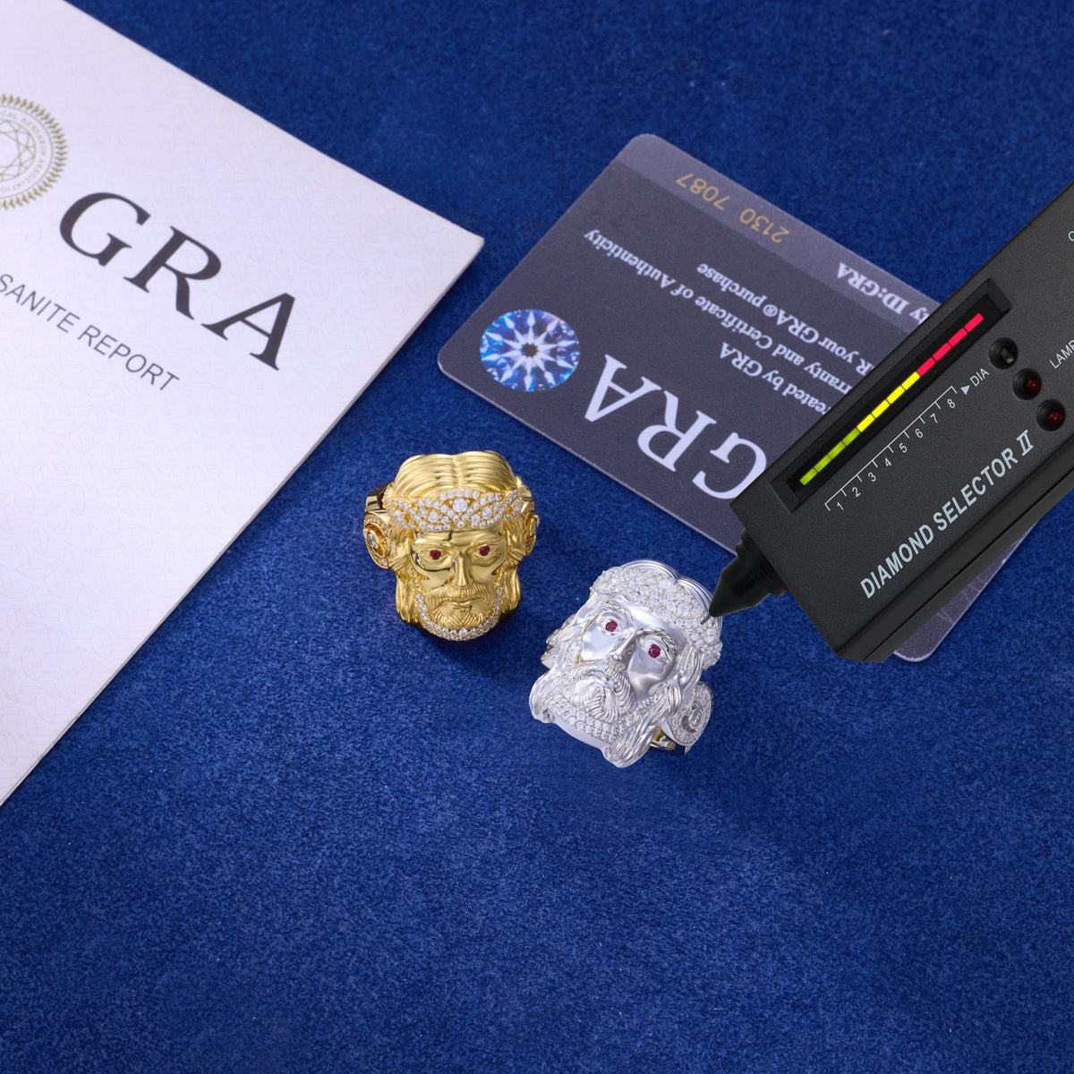 Gold and silver Jesus moissanite rings shown with tester