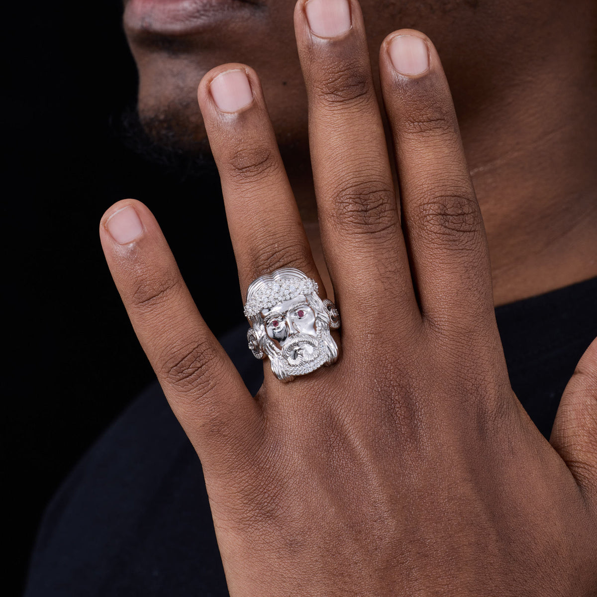 Silver and gold Jesus rings worn