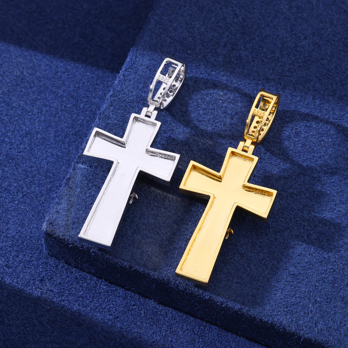 Back view of silver-tone and gold-tone sterling silver crucifix pendants