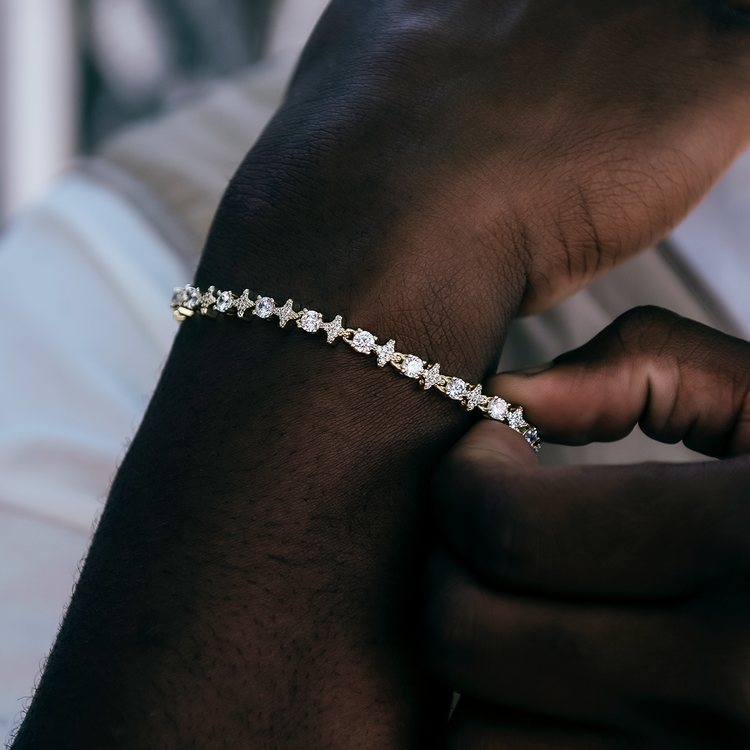 Iced-out star moissanite bracelet on the wrist