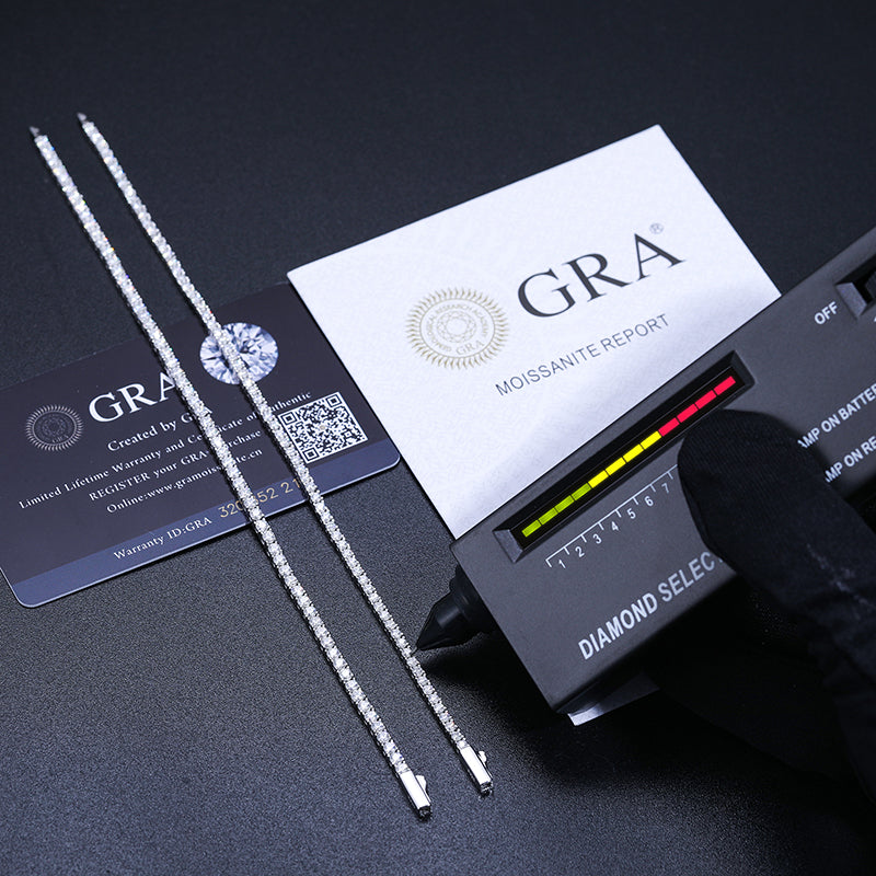 Moissanite tennis bracelets shown with a diamond tester