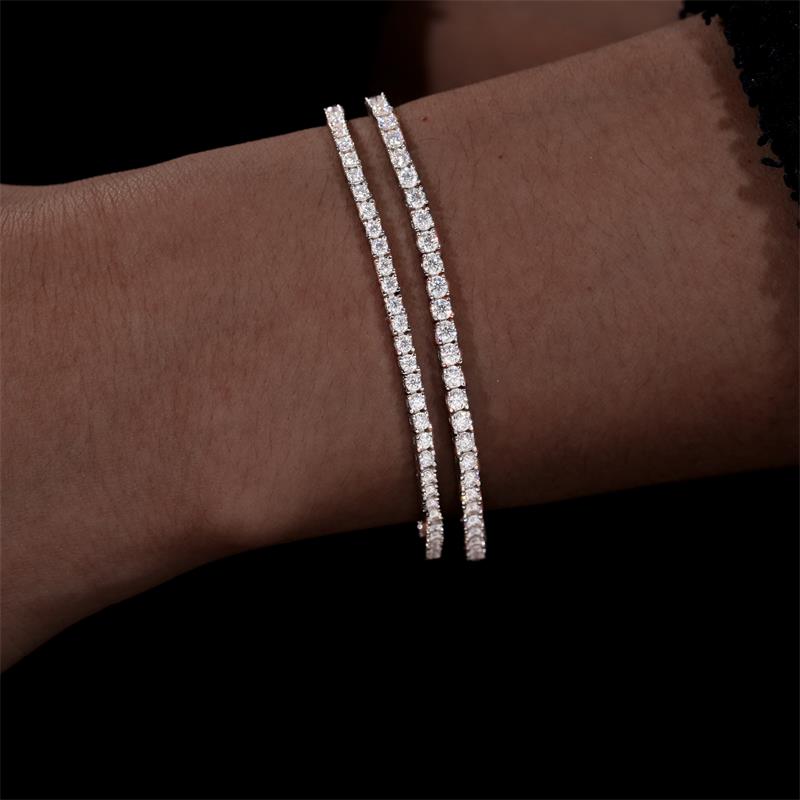 2mm and 2.5mm moissanite tennis bracelets worn together