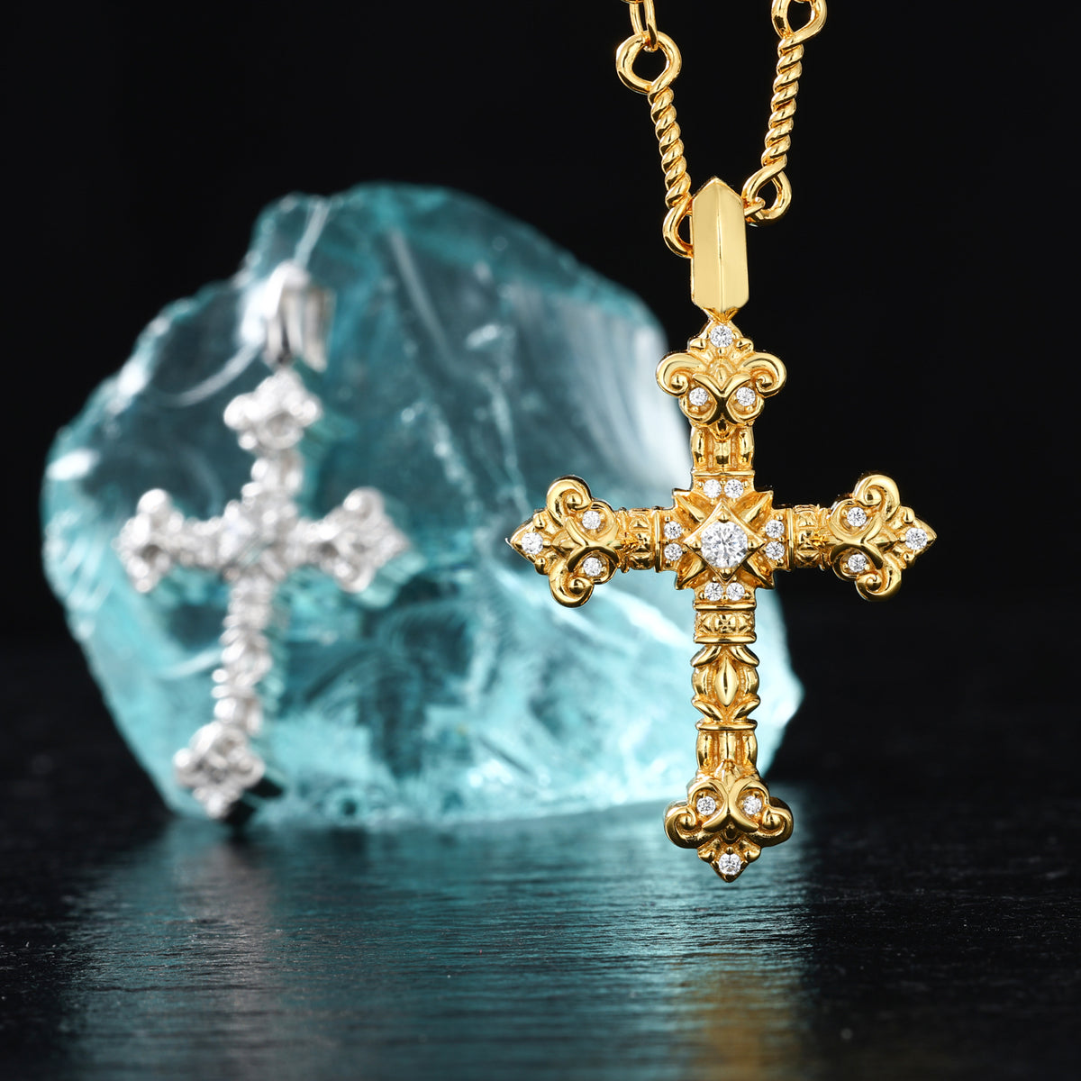 Gold-tone ornate iris cross moissanite pendant