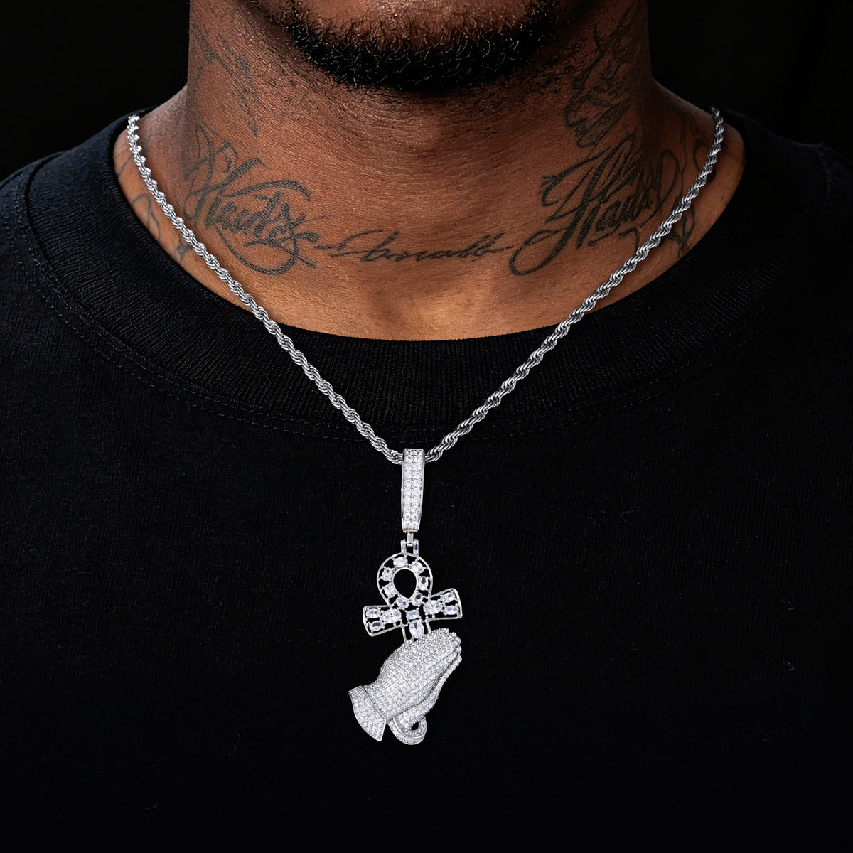 Silver-tone praying hands Ankh moissanite pendant worn