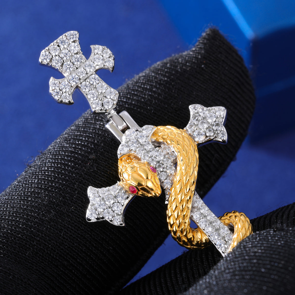 Two-tone snake cross moissanite pendant close up